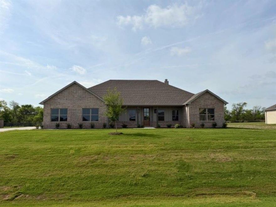 New Construction by Dalton Homes! Experience the perfect blend of modern luxury and country living in the Fort Davis Plan, situated on a sprawling 1 acre lot. Estimated for completion in late March 2026, this home features an expansive open-concept layout designed for effortless entertaining. The chef-inspired kitchen boasts an oversized island with pendant lighting, quartz countertops, stainless steel appliances, and a large walk-in pantry. Unique designer touches abound, including custom wood headers, a functional mud bench, upgraded tile designs, and a cozy brick fireplace. Located in Sanger ISD with a Modern Farmhouse aesthetic, you’ll enjoy peaceful acreage with quick, convenient access to Denton and I35E.