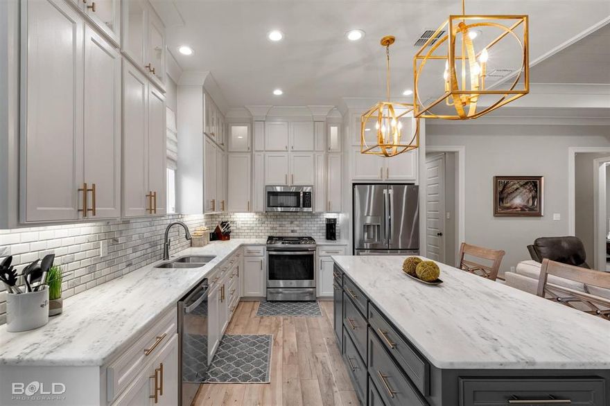 With upgrades and extras already in place, this home offers more than many new construction options. The open living area features high ceilings, a gas fireplace, and large windows that bring in natural light. The kitchen includes marble countertops, custom cabinetry, stainless appliances, and a large island designed for everyday living and entertaining. Refrigerator, washer, dryer, and window coverings remain with the home, providing added convenience and value. The fenced backyard offers an extended patio and pergola, creating a comfortable outdoor space for relaxing or hosting guests. Located in a gated neighborhood where the HOA covers front lawn maintenance, this home provides low-maintenance living with thoughtful upgrades already completed.