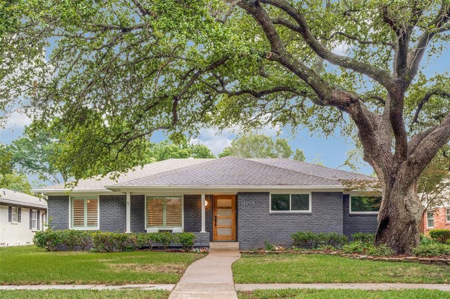 East Dallas home for sale in Merriman Manor featuring 3 bedrooms, 2.1 bathrooms, office, and 2-car garage with 2,236 square feet on an oversized .253-acre lot. Updated one-story home with mature tree, large backyard, and room for pool, located in Dallas ISD near White Rock Lake and close to Downtown Dallas, shopping, dining, parks, and trails.

Light-filled floor plan with open living area, wood-burning fireplace, and direct patio access for indoor-outdoor living and entertaining. Remodeled kitchen (2020) with quartz countertops, stainless steel appliances, and updated cabinetry, open to living and dining areas.

Primary suite with walk-in closet, built-in dressing area, and updated bath with walk-in shower. Secondary bedrooms with hall bath featuring dual sinks. Flexible office space ideal for home office, gym, craft room, or playroom. Separate laundry room.

Backyard includes patio, board-on-board wood fence, motorized driveway gate, privacy, and large yard with space to add a pool.  Two car attached garage with epoxy floor.

Major system and cosmetic updates include kitchen and baths (2020), roof (2020), HVAC (2020), windows (2020), fence (2020), driveway gate (2020), gutters (2022), water heater (2026), and refinished wood floors (2026).

Move-in ready East Dallas real estate opportunity in Merriman Manor with updated systems, one-story layout, oversized lot, and prime location near White Rock Lake and Downtown Dallas.