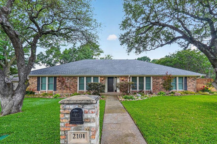Welcome to this extensively renovated South Arlington retreat, perfectly positioned in a highly sought-after community with quick access to I-20. Nestled on a generously sized homesite shaded by towering mature trees, this property delivers the ideal blend of privacy, comfort, and entertaining space. The backyard was designed for enjoying Texas summers, featuring a resort-style pool, expansive patio areas, and plenty of room to host family and friends.

Inside, the home showcases an airy, flowing floorplan where the main living spaces effortlessly connect. A striking two-sided fireplace creates warmth and character between the living and dining areas, while oversized Pella glass doors span the rear of the home, opening wide to create a seamless indoor-outdoor experience unlike anything else.

Over the years, the home has undergone an impressive list of upgrades focused on both style and functionality. Bathrooms have been beautifully modernized, while major improvements include upgraded Pella windows and sliding doors, a recently installed pergola, dual LG mini-split HVAC systems paired with completely updated ductwork, and a replaced roof for long-term peace of mind.

Additional recent improvements elevate the home even further, including enhanced landscaping and drainage systems, a widened concrete driveway, fresh carpet in the bedrooms, updated exterior ceiling fans, and a professionally finished epoxy garage floor. The kitchen is equally impressive, equipped with premium KitchenAid appliances including a French-door refrigerator, dishwasher, and double-oven range, perfectly blending everyday practicality with elevated design.

Every inch of this home reflects thoughtful care and intentional upgrades, creating a move-in-ready property that offers both timeless comfort and exceptional entertaining potential. A rare opportunity in South Arlington, this home truly stands out from the rest.