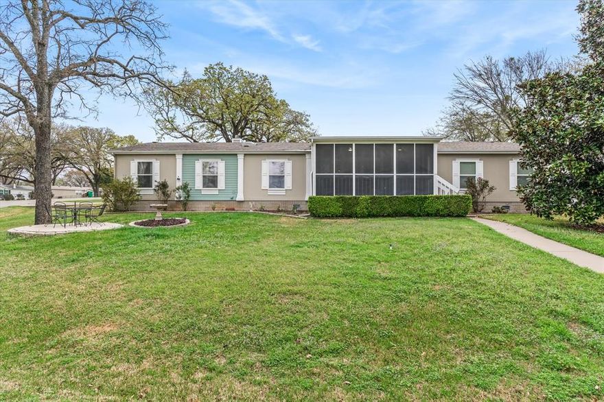 Cedar Creek Lake • Recently Updated • A BRAND-NEW LOOK AT A GREAT NEW PRICE!!! Enjoy the best of lake living in this RECENTLY UPDATED 5-bdr, 3-ba home with open-water views & easy lake access. Located directly across from the water, this property allows for beautiful, unobstructed lake views without the maintenance of waterfront property. An added bonus, the community owns the land and pier across the street, protecting views while providing direct access to water activities. Inside, the RECENTLY UPDATED interior feels bright and welcoming with NEWLY INSTALLED lighting and large windows that frame lake views and fill the home with natural light. Featuring two separate living areas and 5 bedrooms, the home offers plenty of space for entertaining guests or relaxing after a day on the water. The screened lakeside porch is the perfect place to enjoy cool lake breezes and awe-inspiring Cedar Creek sunsets! In the back, a private screened-in porch creates a peaceful retreat with a 6-person spa, comfortable sitting area, and electric fireplace. The RECENTLY REFRESHED kitchen showcases NEWLY updated lighting and FRESHLY PAINTED cabinets, along with a large island and generous counter space for easy entertaining. The spacious primary suite with a private ensuite bath features FRESH PAINT, UPDATED flooring, lighting, and mirrors. Additional interior updates include new door hardware throughout the home and fresh paint in the front porch entry. Outside, enjoy a refreshed landscape along with boating, fishing, and lakeside relaxation from the community pier. Additional highlights include: electric RV hookups, wiring for a whole-home generator, extra storage above garage, and short-term rental friendly. 10165 Northlake Circle is located minutes from Cedar Creek Country Club, offering golf, tennis, swimming, dining, and a boat launch. Whether full-time residence, weekend retreat, or investment property -- this home checks all the boxes. ALL FURNISHINGS ARE NEGOTIABLE!