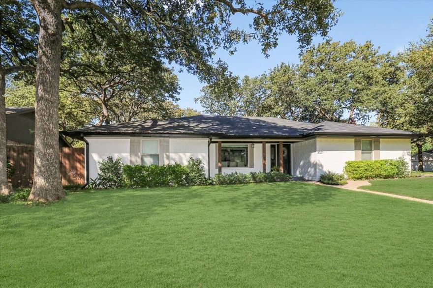 Set on a corner lot with mature trees, this beautiful home effortlessly blends modern luxury with intentional design. No detail has been spared! This property seamlessly blends modern finishes & timeless charm. Entering the home you are welcomed with open living & dining areas with a large picturesque window. Quality & style define this home; as shown with the updated kitchen, bathrooms, hardwood floors, fresh paint, & fixtures. Entertain family & friends in the expansive game room. This versatile space can transform to accommodate your lifestyle. Whether it's game night, a home theater, or a kid's playroom, this large room is the heart of the home. Escape to the outdoor oasis with a large private corner lot. It's a perfect setting for weekend barbecues, morning coffee, or evenings under the stars. This peaceful neighborhood combined with the convenient reach to local amenities, shopping, & top-rated acclaimed schools in Birdville ISD is a must see! Make this gorgeous home yours today!