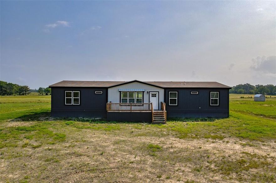 ** BRAND NEW MANUFACTURED HOME ON 1+ ACRE HOMESITE ** Royal Floorplan. UNBELIEVABLE finish outs, upgrades all throughout this BRAND NEW farm-style home! Top of the line concrete runner foundations, highly energy-efficient and EXTREMELY AFFORDABLE! GORGEOUS vinyl flooring throughout living, dining kitchen, hallways, and utility. GORGEOUS kitchen open to HUGE living and dining areas. Step out back to your large deck PERFECT for entertaining! Beautiful views in all directions making for a peaceful, and quiet community! GET THE BIGGEST BANG FOR YOUR BUCK! OWNER FINANCE AVAILABLE