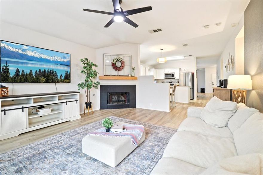 Up to $4,000 closing cost credit available to buy down your interest rate down or help with closing costs! Step into this beautifully updated home featuring brand new high-quality LVP flooring and fresh paint throughout. The living room is anchored by a cozy fireplace, creating a perfect space to gather and relax. The open concept floorplan flows right into the kitchen, where you'll find stainless steel appliances, a generous kitchen island, plenty of storage, a pantry and a nook for dining. This thoughtfully designed home also offers a second spacious living area that could be used as a game room, study, formal dining or anything you can dream up! The private primary suite includes a large walk-in closet and a luxurious ensuite complete with a soaker tub and separate walk-in shower. The split floorplan also has two more good-sized rooms and a bathroom. You'll also enjoy the outdoors in your low-maintenance, fenced backyard, featuring a raised deck ideal for grilling, entertaining, or unwinding at the end of the day on the larger corner lot. Best of all—the home has solar panels that are fully paid off, giving you energy savings for years to come! Located just minutes from Presidio, Alliance Town Center, I-35W, 287, and Loop 820, this home provides quick and easy access to incredible shopping and dining. Plus, the community has fantastic amenities like a community pool, parks, and jogging trails!