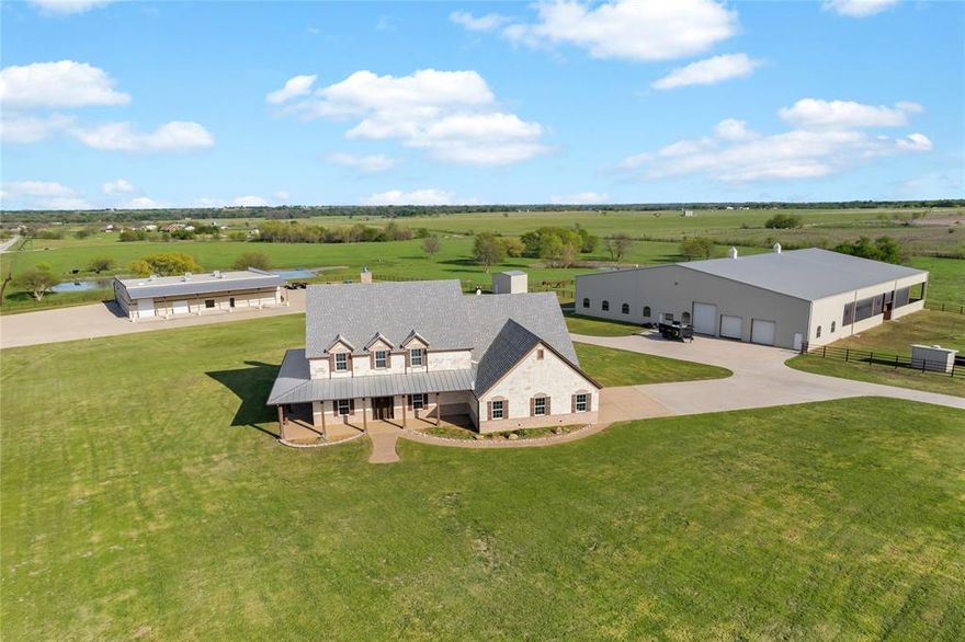 A rare opportunity to own 32 private, gated acres in North Texas with a luxury custom home, equestrian facilities, resort-style pool, guest quarters, and a massive 80’ x 100’ climate-controlled shop. Designed for privacy, flexibility, and elevated country living, this estate offers the scale and infrastructure buyers search for but rarely find.

Property Highlights, 32 gated acres, Custom 4,335 sq ft main residence, 5 bedrooms, 4 full bathrooms, 2 half bathrooms, Dramatic floor-to-ceiling fireplace, Open living spaces with natural light, Dedicated home theater, Private office or study

Equestrian & Land Improvements, Covered riding arena for year-round use, 5 horse stalls, Tack room, Hot and cold wash rack, Full bath in arena, Hay and equipment storage

Standout Features, 80’ x 100’ fully insulated, air-conditioned shop, Multiple bays, Office space, Restrooms, Durable epoxy-coated floors

Outdoor & Lifestyle, In-ground pool with sweeping acreage views, Ideal for entertaining or quiet retreat living

Additional Structures, 1 bedroom, 1 bathroom guest or trainer quarters, Large workshop, RV hookups

Improvements offer exceptional versatility and may support allowable leasing uses. Ideal for equestrian pursuits, multi-generational living, event space, or a private Texas retreat, this estate delivers luxury, land, and flexibility without compromise.