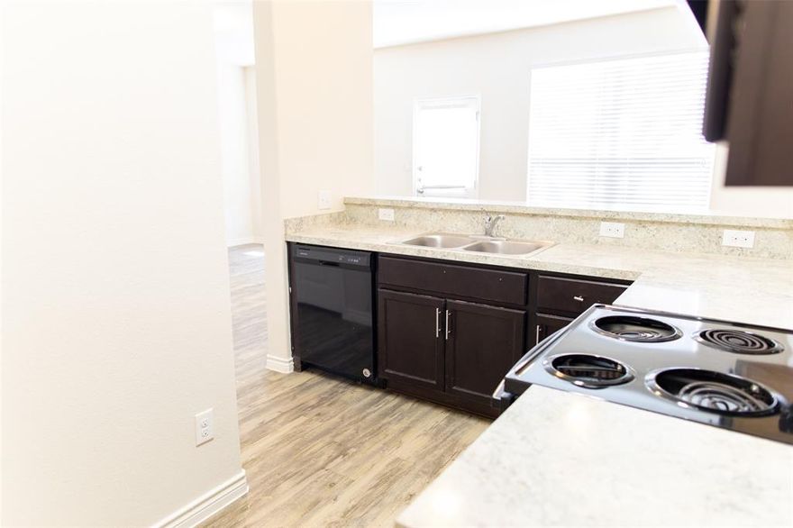 The Huntington is a charming two-story home featuring 3 bedrooms and 2.5 baths, with an open-concept layout that flows beautifully from the spacious family room into the dining area and kitchen—perfect for both relaxing and entertaining. Upstairs, you'll find a private master suite with a large walk-in closet, two additional bedrooms, and a convenient laundry area with washer and dryer hookups. This home also includes wood-grain vinyl plank flooring, a two-car garage, and a fenced backyard. All homes are SimplyMaintained for a $100 monthly fee that includes front and back yard lawn care and exterior pest control. Parkway Villages is a welcoming neighborhood nestled in the heart of Southeast Dallas. Offering a peaceful residential setting with close proximity to everyday essentials, the community blends comfort and convenience in a highly accessible location. Situated within the Dallas Independent School District, Parkway Village provides access to local public schools and nearby parks. Residents enjoy easy access to downtown Dallas, shopping and dining along Military Parkway, and major roadways like I-30 and Loop 12, making commuting throughout the city simple and efficient. Photos are for illustrative purposes only and may show upgrades, and features that are not included.