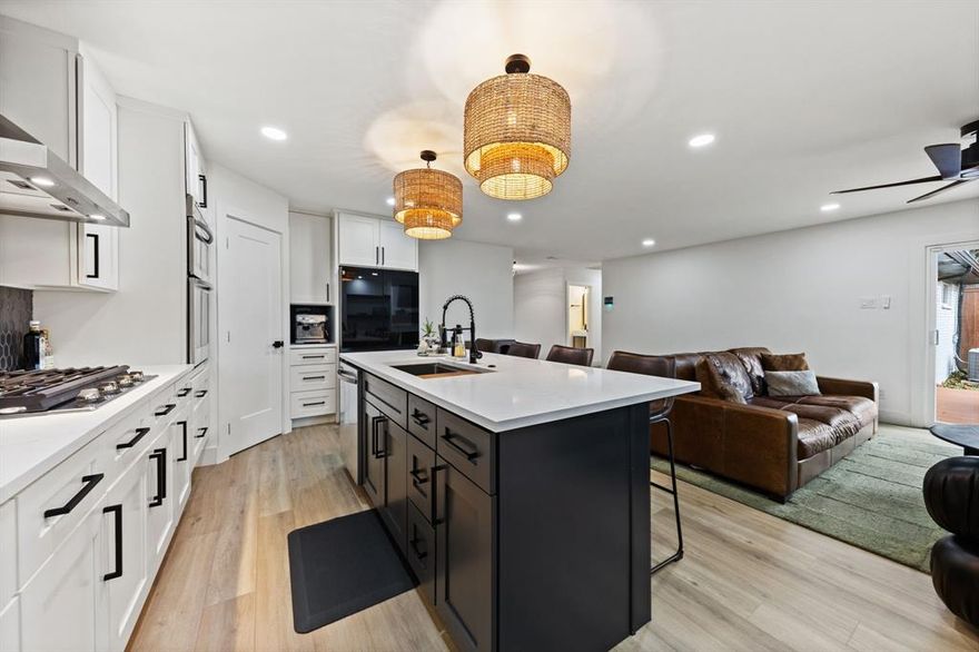 Situated on a quiet interior lot in an established East Dallas neighborhood, this thoughtfully updated home offers a modern layout, quality finishes, and a location that’s hard to beat. The home underwent an extensive renovation in 2023, bringing a refreshed feel throughout while maintaining a comfortable, functional design. The open-concept main living areas flow seamlessly from the living room into the dining space and kitchen, creating an inviting setup for everyday living and entertaining. Durable luxury vinyl flooring runs throughout the home, complemented by updated windows and an upgraded HVAC system and ductwork for year-round comfort. The kitchen opens naturally to the main living space and provides ample storage and workspace, while the fourth bedroom offers flexibility for use as a home office. The primary suite offers a private retreat with a well-appointed bath, and secondary bedrooms are nicely sized with easy access to updated bathrooms. Outside, the backyard features a spacious deck, generous yard space, and a detached garage with additional parking, offering both convenience and versatility. Located just a few homes from St. Francis Park with a playground and basketball courts, and minutes from White Rock Lake, the Dallas Arboretum, Downtown Dallas, and major highways, this home combines updated interiors with everyday practicality in a prime Dallas location.