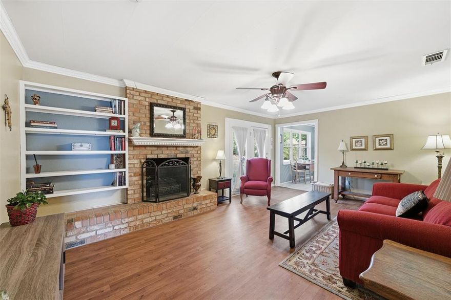 Welcome to this beautifully maintained 3-bedroom, 2-bath home offering 1,822 square feet of comfortable living space. The home features two living areas, including a formal living room, along with a formal dining area and an eat-in breakfast area off the kitchen. The spacious kitchen offers great functionality and features wonderful windows that bring in natural light while opening up to the backyard. All bedrooms include good size closets, providing excellent storage throughout the home. The primary suite includes a private bath. The third bedroom provides direct access to the backyard, adding flexibility to the layout.A generously sized laundry room offers a folding area or desk space for added convenience.  Enjoy the large, fully fenced backyard with an outdoor seating area, perfect for entertaining or relaxing.

Recent updates include a new roof (2008), air conditioning system replaced in December 2016, water heater replaced in June 2020, windows (estimated 2010), chimney cleaning completed in March 2022, and the hallway bathroom shower tub combo refinished with Miracle Method in 2021.