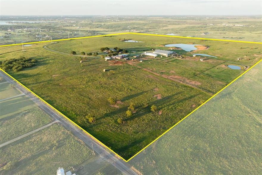 The Over Forty Ranch is a premier 160 acre equestrian and cattle property located just 4 miles south of Wichita Falls. Designed and operated as a large-scale horse breeding and training facility and is fully equipped for both equestrian and cattle operations. The 4,000 sq. ft. main home completely remodeled and features two master suites with walk-in closets, spray foam insulation, two living areas including one with a custom bar and icemaker, a spacious kitchen with walk-in pantry and three ovens, a brick gas fireplace, and a heated and air conditioned dog room. Three covered parking spaces, an insulated garage with three oversized bays for dually pickups, and additional storage above. Guest house and office include a one-bedroom, one-bath guest house, a three-bedroom, two-bath guest house, and a separate office with kitchenette and full bath, along with additional covered parking. Equestrian facilities include a 125 x 125 covered arena with insulated roof, 16 stalls, a vet room, wash rack with breeding stocks, an efficiency apartment, two tack rooms, and automatic waterers in the barn and pastures. Fencing consists of horse-friendly V-mesh wire and pipe, and shelters are located in the pastures. Infrastructure includes barns for hay, tools, and equipment, bulk grain silos, overhead feed bins, and oversized covered parking for trailers and ranch equipment. Cattle facilities are designed for efficient handling with pipe pens, a hydraulic squeeze chute, tub, and loading chute. The land consists of 160 acres cross-fenced into eight pastures planted in Coastal Bermuda and other improved grasses, with five stock ponds and a city water meter supplying ranch with water. Beyond its equestrian and cattle functionality, the ranch offers excellent development potential, with highway frontage between FM 1954 and Parker Road suitable for subdivision into home sites. This property represents a rare combination of legacy, lifestyle, and investment opportunity near Wichita Falls.
