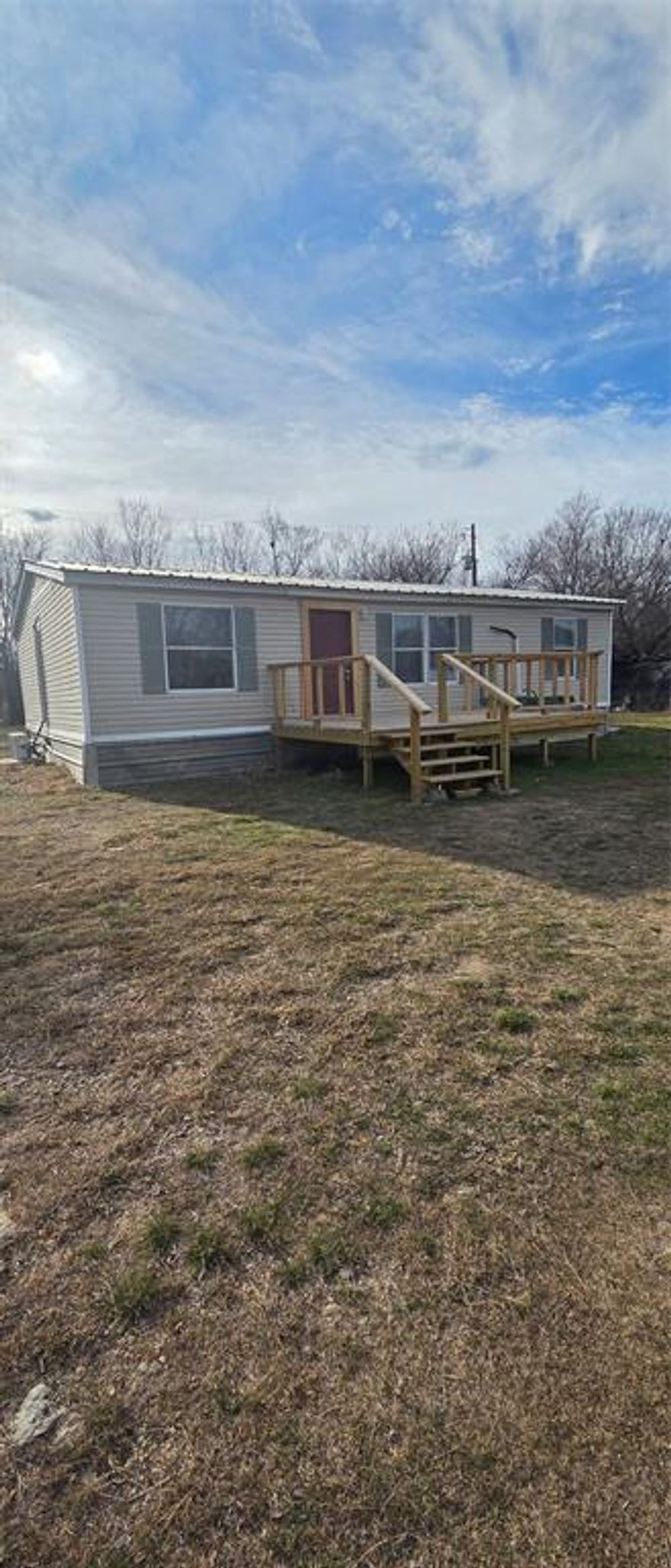 Discover a practical and budget-friendly option with this 3-bedroom, 2-bath mobile home situated on a full acre in Granbury with no HOA. The home offers a simple, functional layout designed for easy living and low maintenance. Mini-split systems provide efficient heating and cooling, helping keep utility costs manageable year-round.

With plenty of outdoor space, the property allows room for parking, outdoor living, or future improvements, all while enjoying the privacy and flexibility of country living. Whether you’re an investor seeking a solid rental or a buyer looking for an affordable home with land, this property presents a great opportunity to own acreage without unnecessary extras.

Space, freedom, and value come together in this Granbury property—don’t miss it.