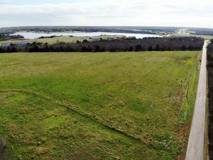 Discover the possibilities with this rare 30-acre opportunity just outside Ennis, Texas in sought after Ellis County. Offered as two parcels sold together, this property features approximately 1,950 feet of road frontage & combines an existing homesite with expansive agricultural acreage, creating exceptional potential for rural living, investment, recreation, or future development. The first parcel, approximately 2 acres, includes an existing as-is home & barn. The residence will require significant renovation or removal, making this an ideal setup for buyers seeking an established homesite with room to build a custom home, restore the existing improvements, or create a private country retreat. The second parcel offers approximately 28 acres with a pond & is currently ag-exempt land used for hay production. This open acreage provides versatility for livestock, farming, recreational use, or simply enjoying the privacy & wide-open space that rural Texas living offers. Conveniently located just minutes from downtown Ennis, the property delivers the peace of the countryside with easy access to local shops, dining, schools, & major highways connecting to Waxahachie, Corsicana, & the Dallas-Fort Worth metroplex. It is also ideally positioned near Ennis Municipal Airport, Texas Motorplex, & Lakes Bardwell and Clark.
With 30 acres across two parcels, substantial road frontage, existing improvements, & productive agricultural land, this property presents a compelling opportunity to create a private homestead, weekend retreat, working ranch setup, or long-term land investment in growing Ellis County.

Buyer to verify utilities, zoning, acreage, exemptions, & development potential. Existing electricity service is set up. New owners will need to establish water service through Rockett SUD. Showings by appointment via SupraOne. Use caution when entering overgrown areas of the property. Parcels #190369 and #190368 to be sold together.