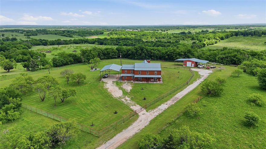 Welcome to 4652 Old Southmayd Rd in Sherman, TX. A thoughtfully updated country home offering space, functionality, and a true Texas lifestyle on 10 beautiful acres. This 4,237 sq ft home features 6 bedrooms and 2.5 bathrooms with a well-designed layout that fits a variety of needs. Inside, you’re greeted by warm finishes and a comfortable, inviting feel. The open kitchen, living, and dining area creates a natural gathering space ideal for everyday living and hosting. The kitchen features custom cabinetry, beautiful granite counter tops, and a spacious pantry. The home has a water filtration system and a water purifier RO system in the kitchen island. The spacious primary suite is located downstairs and includes dual sinks, a garden tub, walk-in shower with custom stonework, and a large walk-in closet. Two additional bedrooms and an oversized laundry room are also on the main level. Upstairs offers the remaining bedrooms along with a second living area currently set up as a media and game room. Outside, the property is set up for both recreation and function. A 24x30 insulated shop with electricity and 20’ overhangs on both sides provides excellent workspace and storage. There are livestock pens on the north side for smaller animals, and the property is fully fenced with barbed wire, and with pipe fencing and no-climb wire surrounding the home to help keep pets secure. Covered parking accommodates vehicles, RVs, and boats with ease. Enjoy peaceful sunsets from the front porch while taking in the quiet country setting. Conveniently located near Lake Texoma & Hagerman Wildlife Refuge, with easy access to Sherman and approximately an hour to the DFW Metroplex, this property offers the balance of rural living and accessibility.
