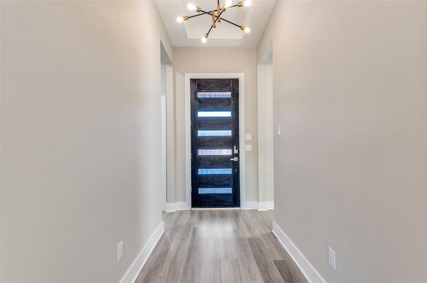 Crisp, fresh and move in ready. This 2023 three bedroom, one story home has a nice open floorplan, quartz countertops, Kitchen island and walk in pantry, walk in closets, big primary bedroom, a separate office study with closet, big walk in utility room and a large covered porch and deck opening out to the big back yard. Lots of sunshine from energy efficient double pane windows with pull down shades. Primary bathroom has large walk in shower, large soaking tub, walk in closet with safe and dual vanities. Second bathroom has tub shower with inset tile accents. Smart lighting controls and dimmers inside, soffit lights and wall accent lights outside and a heavy slider gate across the driveway.