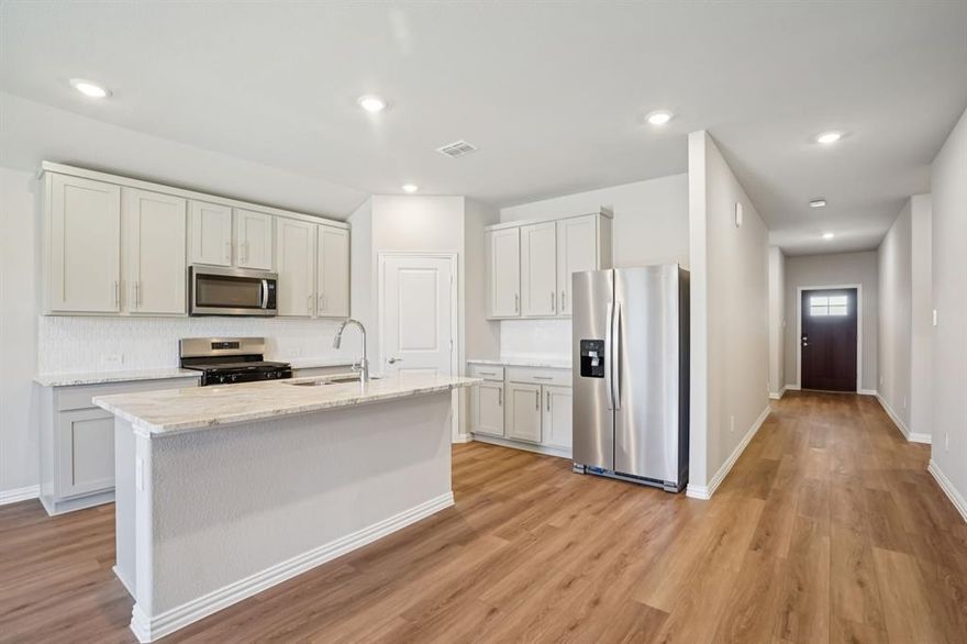 Brand new, energy-efficient home available by Dec 2025! Fix dinner at the Greenville's sprawling kitchen island without missing any of the action in the family room. Pebble cabinets with marble-look white granite countertops, beige tone EVP flooring and multi-tone grey carpet. Situated perfectly in a small town, Stonehaven homeowners will enjoy the benefits of an effortless commute to Dallas using nearby I-20 and Highway 175. This serene community also boasts amenities including a resort-style pool, kid's splash pad, cabanas, and a children's playground. Schedule a tour and see our energy-efficient features like multispeed HVAC systems, spray foam insulation, and high-performance air filtration.* Each of our homes is built with innovative, energy-efficient features designed to help you enjoy more savings, better health, real comfort and peace of mind.