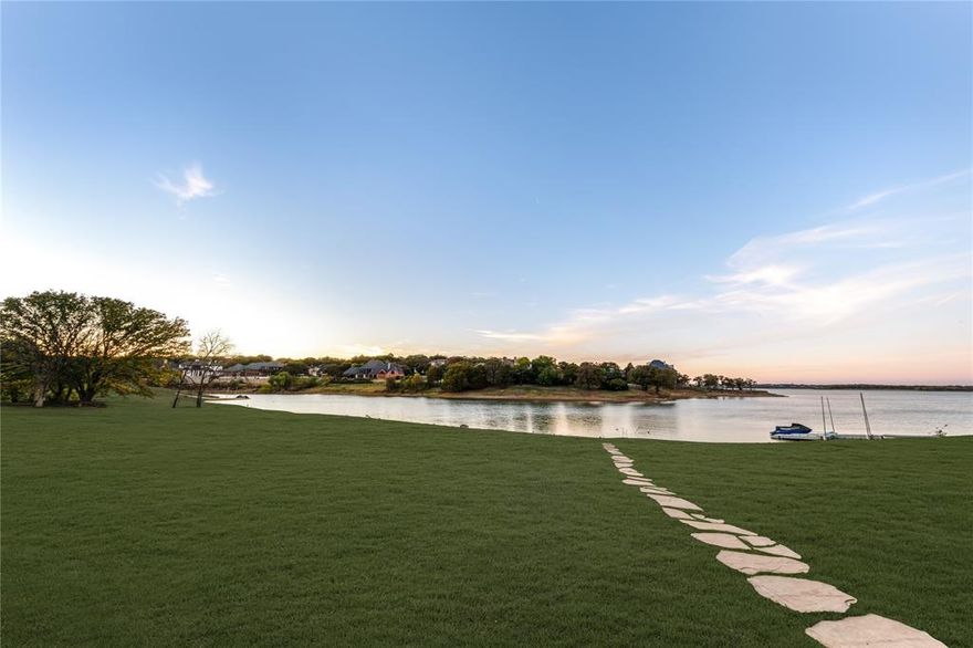 1 of only a handful of true lake homes in the area-3111 Lake Creek Drive in The Pointe at Highland Shores, a truly exceptional waterfront custom home on one of the most coveted streets in Highland Village on the waters of Lake Lewisville. Not often do lake front homes, with this location & of this quality come to market, truly a rare opportunity!Brought down to the studs, a recently completed remodel done with unwavering attention to detail, this transitional classic home showcases luxurious finishes, meticulous design & unending style. From the moment you step inside, the home's stunning craftsmanship is immediately evident, a soaring glass wall - the entire home is bathed in natural light, sparing no expense with the custom sky bridge made for soaking in lake views, a grand gourmet kitchen with bespoke cabinets, a La Cornue range and plenty of spaces throughout that flow seamlessly for indoor-outdoor living. A dream for family gatherings and multigen enjoyment! Large study w custom built-ins & secret door leading to workout room, a wine cellar, poker lounge, glass enclosed cabana bar that opens up to an infinity pool, easy lake access & amazing sunsets on the water. Upstairs is 6 ensuite bedrooms as well as bunk room with locker-style bath, massive game room w large entertainment balcony overlooking the lake, a cozy library for tucking away the entire home was designed with intentional private areas for gathering in small groups and to provide cozy spaces to retreat to so everyone can enjoy having room without compromising comfort & peace! Feeding to Mcauliffe&Briarhill easy access to Liberty Christian in Argyle&you don't have top sacrifice shopping and other modern conveniences!Close enough to Frisco & easy access to DFW airport. Enjoy the lakeside retreat living everyday with the freedom to install a floating dock to complete the best-of-both-worlds resort lifestyle living. Perfect legacy home in an unbeatable location!
