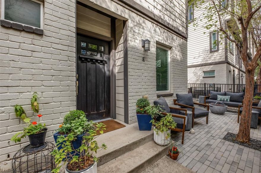 Beautifully finished 2-bedroom, 2.5-bath corner-unit condo situated on the interior of the community, offering a quiet setting while remaining just minutes from Lower Greenville’s popular restaurants, shopping, and entertainment, as well as offering a convenient commute to Downtown and area roadways. The stylish kitchen features beautifully crafted cabinetry, granite countertops, glass tile backsplash, and stainless steel appliances. The spacious primary suite provides a relaxing retreat with a walk-in closet and spa-inspired bath complete with a soaking tub, separate shower, dual sinks, and generous counter and cabinet storage. The second bedroom includes its own en suite bath, ideal for guests or roommates. A dedicated first-floor office with built-in desk and shelving adds valuable flexibility for work or study. Outdoor living is a highlight with a large gated front patio and a covered second-level balcony offering additional space to unwind. An attached two-car garage completes this well-appointed home. Move-in ready and ideally located for modern urban living.