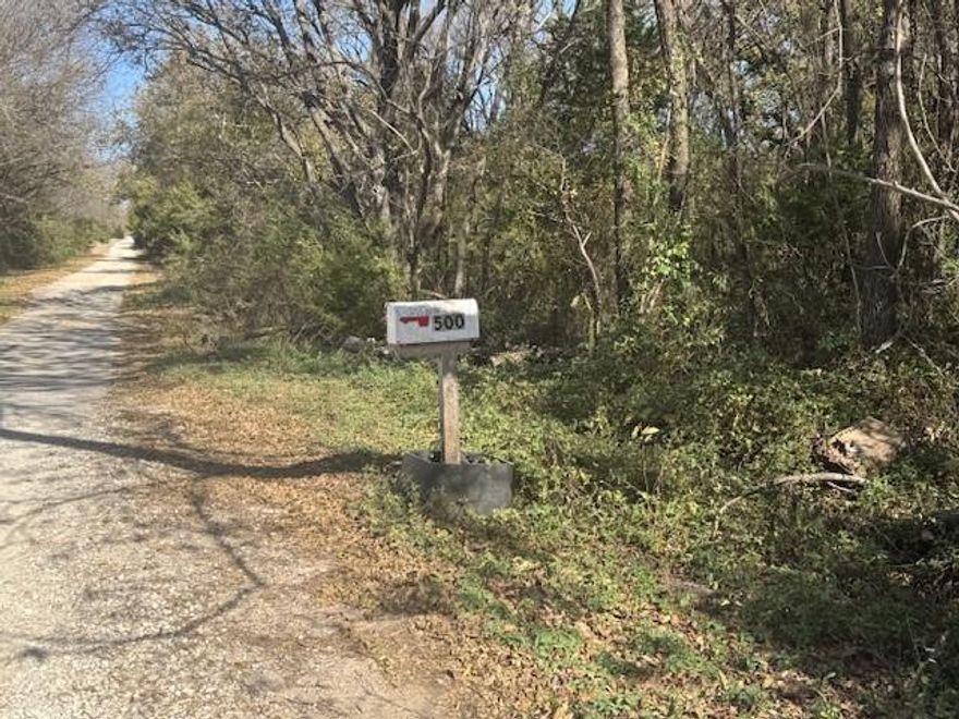 Wow over 4 acres with a tiny Home. The home is 576 Sq feet, with bathroom and open studio type home includes a full kitchen, laundry area, bedroom,, family room and small living area.  This home has a new hot water heater and is perfect for a hunting cabin or make some tweaks to make it an adorable tiny home.  
The appliances will convey with acceptable offer.