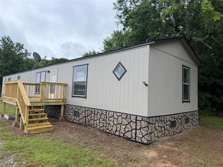 Whether you're looking for a weekend retreat, a homestead, or an investment, this 1.85 acres delivers endless possibilities. Move-in ready and thoughtfully planned, this home is a strong option for buyers seeking comfort, efficiency, and a well-balanced indoor-outdoor living experience. This 2024,  3 bedroom, 2 bath home features a split floor plan and an open, inviting layout that feels like new, with most kitchen appliances included for easy move-in.  The kitchen flows seamlessly into the dining and living areas--perfect for family gatherings or entertaining. The unique walk in pantry is like a hidden safe room. The master suite with its own bath.  Large laundry room. Wood look luxury vinyl flooring in main area of the home is easy upkeep.