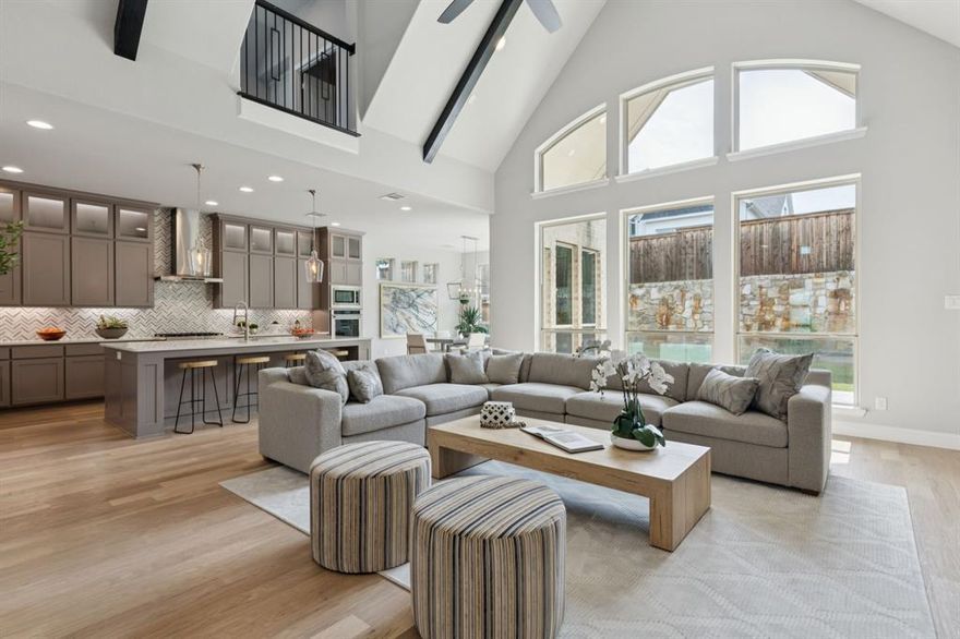 Amazing opportunity perfectly positioned in the coveted community of The Grove! This home has been meticulously maintained, and the entire first floor now boasts new hardwood floors and a brand-new kitchen island. The kitchen’s open layout spills effortlessly into the family and dining room, creating one spacious, light-filled hub that’s tailor-made for entertaining. The secluded primary suite feels like a private resort, featuring a spa-inspired bath with a deep soaking tub, an oversized glass-enclosed shower, and a spacious walk-in closet. The first floor also hosts a secluded guest suite with its own en-suite bath and generous walk-in closet. The house also has a private study ideal for working from home. Upstairs, you’ll find two well-appointed bedrooms plus a generous game room that opens directly into an adjoining media room—perfect for movie nights or game-day gatherings. The home is complemented by a three-car tandem garage, offering ample space for vehicles and storage.