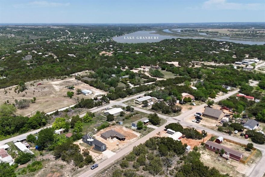 ASK LISTING AGENT ABOUT THE 1% RATE BUYDOWN INCENTIVE WE CAN OFFER. HOME OWNERSHIP WITH AN ESTIMATED MONTHLY PAYMENT AS LOW AS $1,400. AND THAT'S NOT ALL...SELLER IS OFFERING BONUS BUYER INCENTIVES UP TO $5,000! Enjoy the Granbury lake life in this new home, located less than a mile from the community boat ramp! This home offers a spacious, open floor plan, double vanities in the master bath, a tub-shower combo in both bathrooms and generously sized closets. This property features a brand new septic system, new skirting, new kitchen appliances, new flooring, new HVAC, a new roof and brand new cedar shutters! All major components have been recently installed for worry-free living. This home qualifies for all loan types. Contact the agent for buyer incentives.