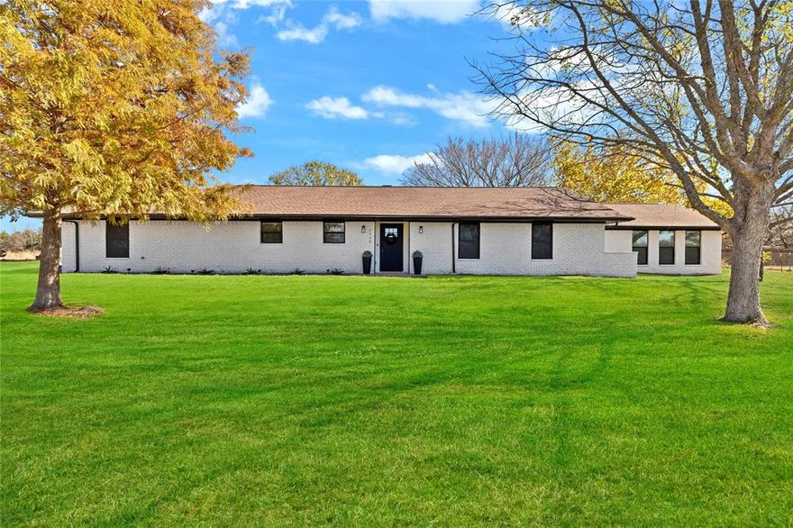 Experience the perfect blend of modern living and country charm with this beautifully remodeled home situated on over 2 acres in McKinney, now offered UNDER appraisal value of $810k, so hello to instant equity! Homes with this much land, quality, and location are nearly impossible to find at this price. Every inch of this property has been thoughtfully updated with high-end finishes, designer details, and a functional open-concept layout. Featuring 4 bedrooms, 3 full baths, including two private primary suites, and a spacious home office, this residence is designed to accommodate a variety of lifestyles. The inviting living area showcases a gas fireplace and flows seamlessly into the kitchen and dining spaces, ideal for entertaining or everyday comfort.

Outside, you’ll find a 30x40 insulated shop with electricity, spray foam insulation, and pre-wired for mini splits, offering endless possibilities for work or play. Additional features include a storm shelter, mature pecan trees, no city taxes, and an impressively low 1.38 tax rate. Enjoy serene country living with easy access to shopping, dining, and major highways — truly the best of both worlds. All the hard work has been done — simply move in, unwind, and enjoy your piece of North Texas paradise.
This one checks every box — style, space, and location!
Don’t miss your chance to make it yours!