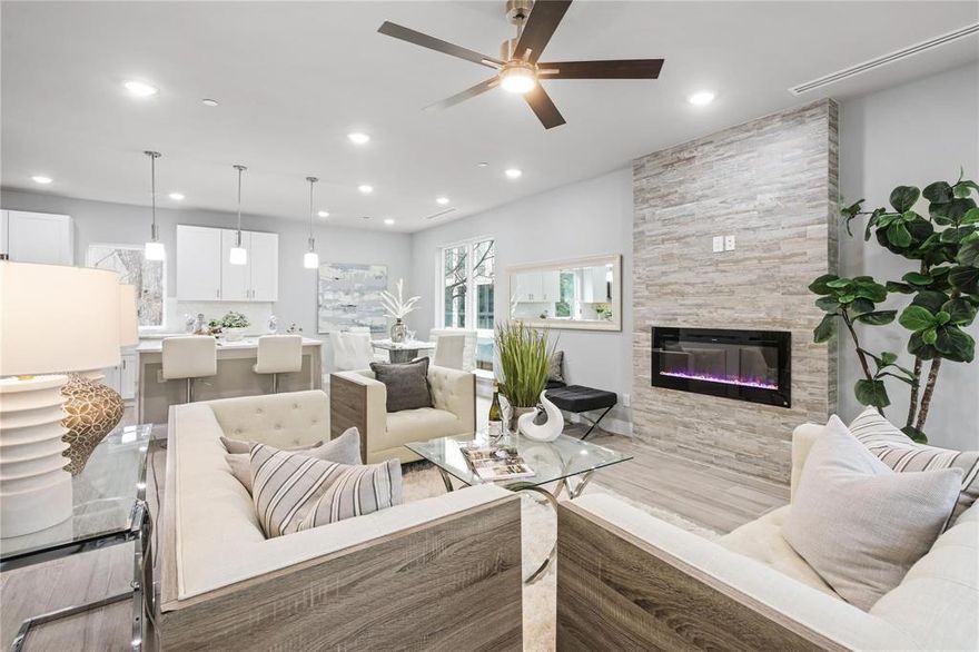 Welcome to The Verandas - luxury living in Dallas' East Village. This 4-unit gated townhome community was completed in Jan 2023 and is ready for its first residents. Let's start at the top with the well-appointed turfed Veranda (rooftop) that includes a covered patio, outdoor kitchen, hot tub, half bath, and dry bar. The next level down is the primary suite with two large walk-in closets and a dreamy bathroom where you can soak for days. Also on this floor is bedroom and bathroom #2 with a large walk-in closet and the laundry room. The second floor includes an open concept living room with a fireplace and balcony, a large kitchen with an island, and a walk-in pantry and dining area. The first floor has the entryway from the front door and garage, an office that opens to a turfed, fenced backyard. Hot tub maintenance & cleaning service included. A long-term lease is preferred but short-term will be considered. Pets' negotiable. #104 includes an extra parking spot & more yard space.