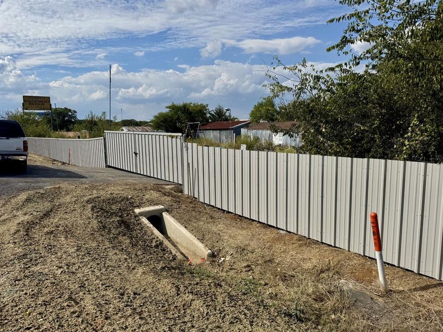 2.52 ACRE Commercial LOT with Metal Workshop in Joshua-Burleson, Conveniently Located just EAST of FM 1902 and Chisholm Trail Parkway TOLL Road. Previous Use: Auto Salvage. Currently Zoned Light Industrial and Commercial. Water, Septic and Electric connections exist but current condition cannot be verified or warranted. Minerals DO NOT Convey.  NO Survey Available.  Property Taxes Reflect City of Burleson Jurisdiction - Joshua Mailing Address. NOTE: Negotiation of Professional CLEAN UP OF LOT possible with acceptable offer.