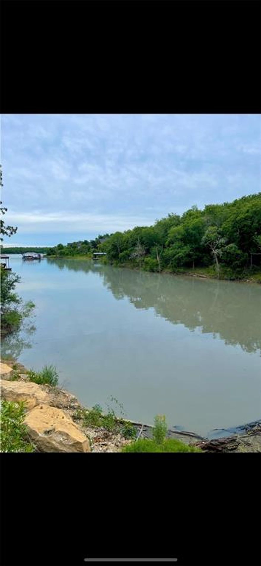 Beautiful wooded water front lot on Lake Bridgeport.  Corner lot with plenty of room to live and play. Gated community with private boat ramp, pool and sports court. Seller is a custom builder that can also build your dream home!