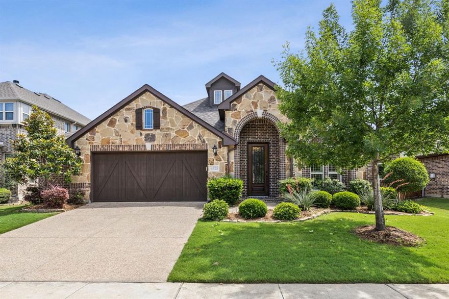 **Keller ISD! Sparkling Pool! Incredible 1.5-Story Floorplan!**

Nestled in the sought-after Steadman Farms community and zoned for acclaimed Keller ISD, this stunning 1.5-story home offers exceptional curb appeal with lush landscaping and an inviting presence. Inside, you'll find handscraped hardwood floors, recessed lighting, and beautifully lit decorative art niches that add a touch of elegance throughout.

The heart of the home is the gourmet kitchen, featuring an oversized center island with breakfast bar, stylish pendant lighting, stainless steel appliances including a 5-burner gas cooktop and double oven, a spacious walk-in pantry, and a designated coffee bar area. The kitchen flows seamlessly into a grand living room, highlighted by striking wood beam cathedral ceilings and a cozy gas fireplace—perfect for everyday living and entertaining.

The thoughtfully designed floorplan includes a secluded master suite with two walk-in closets and a spa-like ensuite bath complete with dual vanities, a frameless glass shower, and a luxurious soaking tub. The secondary bedrooms are split for privacy, with 2 downstairs and 1 upstairs—each with large closets. The staircase is tucked away at the back of the home, adding to the unique and functional layout.

Upstairs also features a spacious game room, ideal for movie nights or play. Step outside to your private oasis where a sparkling, well-maintained pool awaits, visible from the covered and gated back patio with a ceiling fan. There’s still plenty of green space for pets or play, creating a perfect balance of relaxation and recreation.

Located just minutes from major highways, shopping, dining, and community amenities including a park and pool—this home truly has it all. Don't miss your chance to own this rare gem in a prime Fort Worth location!