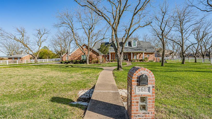 Located in the Equestrian section of Pecan Plantation, this family-sized home on almost 2 acres is fenced and cross-fenced with a 2-stall horse barn with tack room. Open concept floor plan with gourmet kitchen, split master and separate office or library as well as an enclosed sunroom. The lot features 40 mature pecan trees (recently trimmed), orchard irrigation (big water savings) and a well-manicured yard. Detached shop with roll up door and lots of room for tools and toys with same exterior as house and stable.  Pecan Plantation offers something for everyone: golf, tennis, fishing, archery, lake access, clubhouse, swimming pools, rec center, security gate, airports, parks, shopping center and more.  Located 35 miles southwest of Ft. Worth.