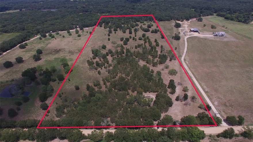 Serene rural land for sale, located outside the city limits in Scurry. This expansive 23.61 acre property features a pond and is fully fenced. This property is the perfect setting for building a new home, as well as lending itself to a wide variety of agricultural uses, including cattle and horses. A newly paved asphalt access road provides easy, reliable year-round access. Embrace country living with generous space, versatile potential, and the peaceful surroundings of this prime rural parcel.  Call today to set your appointment!