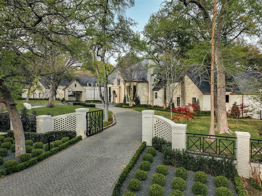 Discover incomparable craftsmanship and style in this regal showplace on 2.3 acres in bucolic Old Preston Hollow. Showcased as the 2022 Kips Bay Decorator Show House and featured in Architectural Digest, a residence of this stature and sophistication is a rare find. No expense was spared to create an exceptional indoor-outdoor retreat featuring formal living and dining, a study, masterful Christopher Peacock kitchen and family room wrapped in designer wallcoverings, walls of windows and soaring ceilings. Enjoy a palatial owner's retreat and five additional suites. Outdoors, multimillion-dollar upgrades include a poolside oasis and extensive landscaping. Gated drive, motor court, two garages. Unrivaled location.