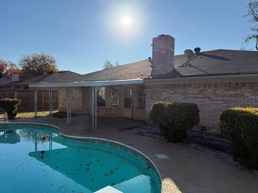 Welcome home to this lovely three-bedroom, two-bath residence, perfectly situated in an established and highly sought-after Bedford neighborhood. This charming property offers tenants a true backyard oasis, featuring a mature, well-maintained yard, a relaxing covered patio, and a sparkling pool—an ideal setting for hosting unforgettable summer cookouts and parties. Inside, the home boasts an enclosed garage, which provides flexible options for tenants, whether as additional climate-controlled living space or for extra storage. Further enhancing its appeal and value, brand new energy-efficient windows are currently being installed, ensuring comfort and lower utility costs for the next resident. This home truly offers a blend of classic neighborhood charm and desirable modern amenities.  Swimming pool maintenance is included.  Pets on a case by case basis to be approved by landlord.