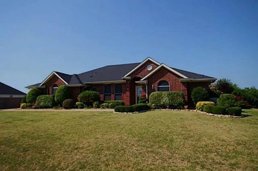 This charming single-family home located at 1415 W Oaklawn Dr in Terrell, TX was built in 1998. It features 3 bathrooms, a spacious finished area of 2,332 sqft., and sits on a generous lot size of 43,56 sqft. This well-maintained property offers ample space for a growing family and is perfect for entertaining guests. With its prime location and modern amenities, this home is a wonderful opportunity for anyone looking to settle down in a cozy and welcoming neighborhood.