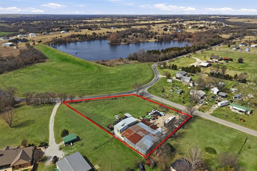 Discover the freedom and opportunity that come with owning 1.75 acres in the growing community of Sanger, Texas, where wide-open space meets endless potential.This unique property offers the perfect blend of country living, investment opportunity, and future development possibilities in an area experiencing steady northward growth as businesses and families continue moving beyond the Metroplex.

Imagine waking up to peaceful mornings, open skies, and the quiet sounds of nature instead of traffic and crowded neighborhoods. Here, you can truly enjoy the feeling of being away from it all while still maintaining convenient access to nearby cities, shopping, and major roadways. Whether you envision building your custom dream home surrounded by land, creating a private homestead, or designing a live-and-work lifestyle, this property provides the space and flexibility to bring your vision to life.

The land already features established electricity and water, offering tremendous value and reducing upfront development costs for future plans. A charming two-bedroom, one-bath apartment sits on the property, ideal for immediate occupancy, guest quarters, rental income, or temporary living while you build. In addition, a covered shed currently operating as a rented automotive workshop provides income-producing potential or could easily transition into storage, hobby space, or a personal business setup.
As Sanger continues to expand and growth pushes north, properties with acreage, utilities in place, and mixed-use potential are becoming increasingly rare. Whether you are an investor seeking long-term appreciation, a buyer dreaming of country living with room to grow, or someone looking to escape the congestion while staying connected, this property presents an exceptional opportunity to secure land in the path of progress.
 Buyer to verify zoning and permitted uses.