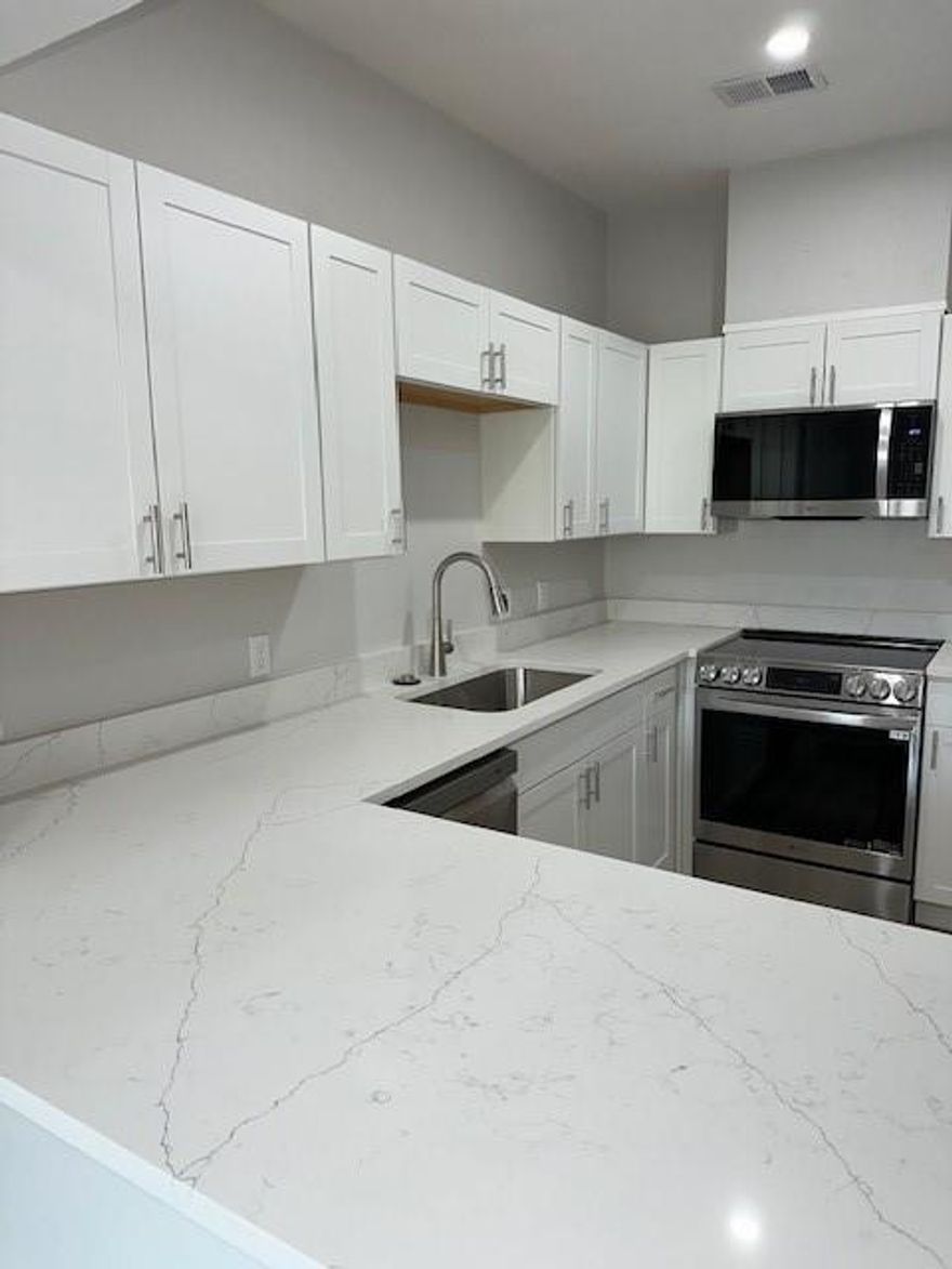 Move in ready. Must see new remodel. All new cabinets, quartz countertops, appliances, LVP flooring, tub, shower, and more.
Covered reserved parking just a few steeps away from the elevator.