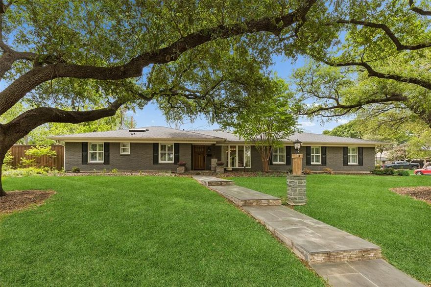 Nestled within a serene neighborhood shaded by mature trees, this home offers a rare sense of privacy in an established neighborhood while providing the benefits of urban living. Inside, the home opens to a bright, open and inviting layout designed for both everyday living and effortless entertaining. The expansive living area features striking beamed ceilings and a cozy fireplace, seamlessly flowing into a beautifully updated kitchen with a large island, quartz countertops, stainless steel appliances, gas cooktop with pot filler, farmhouse sink and generous pantry space. Just beyond, a spacious mudroom with a second refrigerator adds convenience and functionality. A standout feature is the flexible layout with TWO private primary suites positioned on opposite sides of the home - ideal for multi-generational living, guests, roommates or a private nanny suite. One suite offers a spacious sitting area, while the other includes a charming “mini kitchen” setup, creating a truly independent living option. Both are outfitted with luxurious spa-like bathrooms. The 3rd and 4th bedrooms share a nicely updated J&J bath. Step outside to your own backyard retreat, where a sparkling pool and covered entertaining area provide the perfect backdrop for relaxing or hosting gatherings year-round. Thoughtfully updated with quality improvements throughout, this home combines modern comfort with timeless charm in a uniquely tranquil setting.