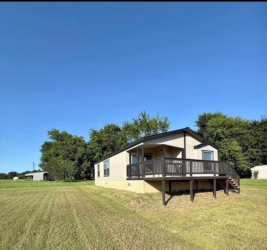 Well-maintained, one owner, 2 bedrooms, 2 bathroom home, situated on a 50’ x 150’ lot in the gated community of Holiday Villages of Lake Fork, features an extended deck leading to a cozy covered porch, extended driveway, with a carport, with beautiful crape myrtles lining the property. 

This property offers direct access to a well known popular lake of Lake Fork, this beautiful lake is ranked third in the Bassmaters magazine list, of the best bass lakes of 2025. 

Community amenities include gated entry, fishing piers, boat ramps, clubhouse, saltwater pool, playground, mini golf, basketball court, and picnic tables.  This community is perfect for full-time living, weekend getaways, or investment opportunities.