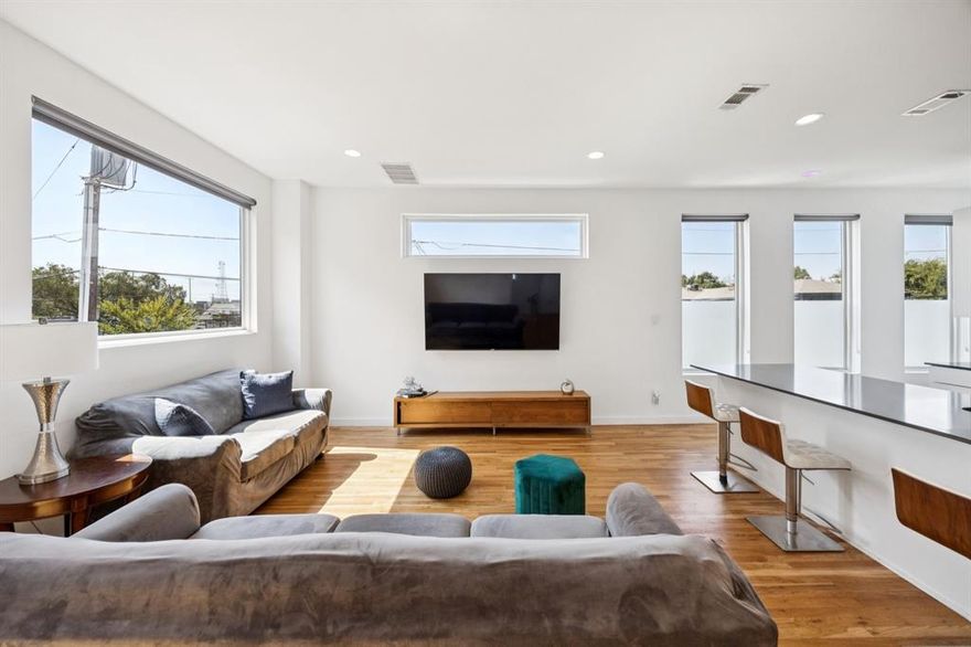 Spread across four levels, this stunning corner-unit townhome offers the perfect blend of style, function, and city living. Featuring 2 bedrooms, 2.5 baths, and a two-car garage, this home boasts an open-concept living space and a sizable primary suite designed for comfort.

Enjoy an abundance of natural light thanks to the corner-unit positioning and numerous windows, plus take in unobstructed views of Dallas from your private rooftop deck — the perfect spot to entertain or unwind.

Thoughtful upgrades include finished flooring on the first floor, blinds throughout, and custom garage shelving for extra storage. As a bonus, you’ll have two additional parking spots conveniently located right next to the unit.

This home truly checks all the boxes — modern design, incredible views, and a location that puts you close to everything Dallas has to offer.