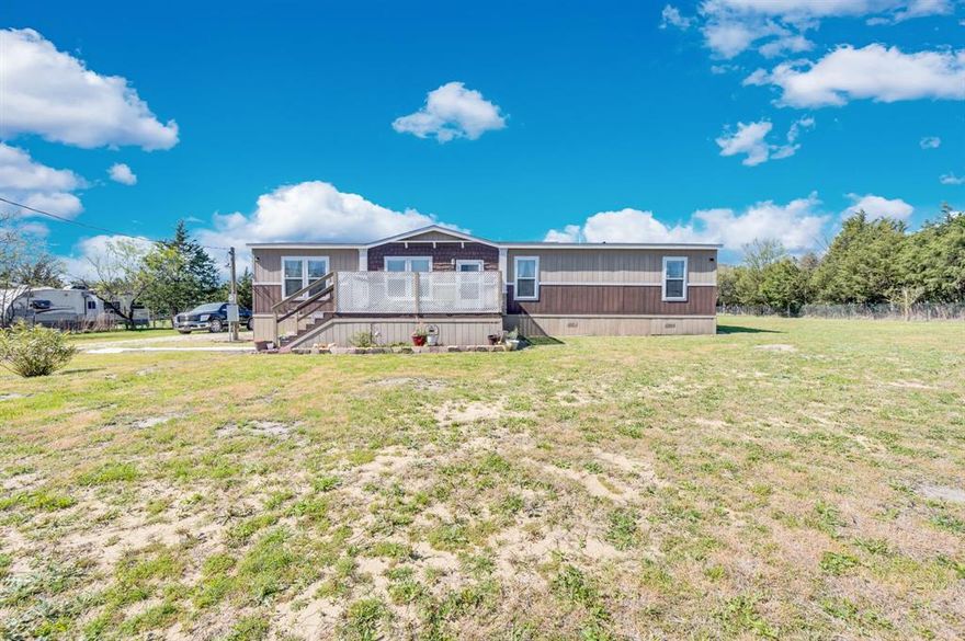 Want room to spread out and not have an HOA or City Taxes? Then I have the place for you. This VERY well maintained 2017 mobile home on .8 acres has 4 beds, 2 baths, family room, open concept kitchen and living room with vaulted beam ceilings with split bedroom arrangement. Seller added all the features you need. Shed, tall carport for RV and more with a ramp, septic system, hvac system, solar powered electric gate and whole property is fenced and are only a few years old. The primary bathroom has a huge walk in shower, 2 sinks and huge walk in closet. You'll definately be impressed with this property. It's priced to sell.