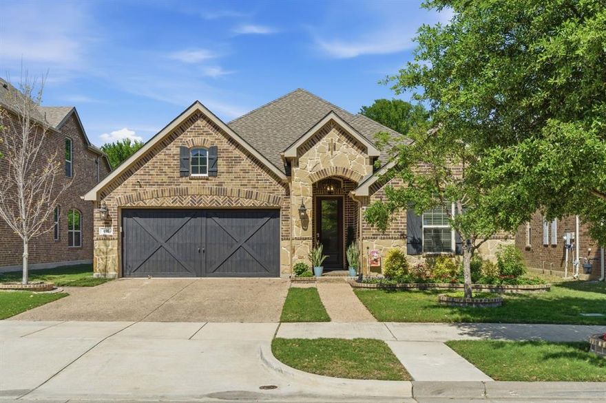 This beautiful well-maintained home is waiting for a new family to enjoy all it brings. From the lovely curb appeal to the welcoming entrance, this home delivers a sense of comfort. Step inside to continuous flowing wood floors through the home except in the wet areas of the laundry & bathrooms. The private executive office can accommodate a large desk for working in the comfort of your home. The kitchen is a chef’s dream with upgraded stainless appliances, 42 in. white cabinets, large eat-in island, walk-in pantry with site-lines to the breakfast nook, family room & enclosed screened patio serving as an additional living area. The primary bedroom & en-suite serves as a private peaceful retreat. Two walk-in closets will please both owners. The secondary bedrooms & guest bath give all needed privacy. There is also a half bath that is great for guests when visiting. Walking out from the breakfast nook is an impressive outdoor living area with dining, casual lounging for entertaining & TV watching. Step outside to the designated cooking area along with additional yard that can be used. This home backs to an undeveloped area giving it privacy & a perfect location for any owner. This home is centrally located between Dallas & Fort Worth, DFW airport, schools, shopping, restaurants & entertainment. Truly a must see!