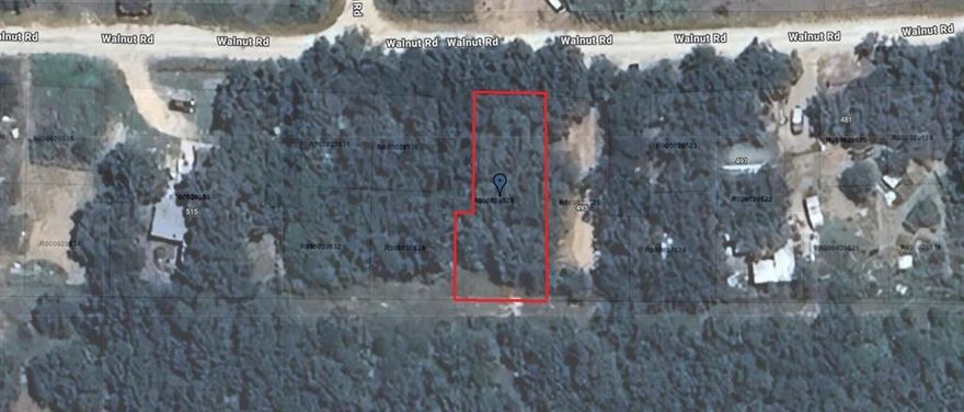 An interactive map would mark the property at 497 Walnut Rd., Nocona, TX. Nestled in the picturesque landscape of North Texas, this land presents a setting for those seeking a serene lifestyle without sacrificing the conveniences of modern living. Residents of this charming locale enjoy a walking distance to the beautiful and natural Lake Nocona, surrounded by rural tranquility and quick access to the bustling urban amenities of nearby cities, such as Denton and Fort Worth. This balance makes it an appealing choice for families, retirees, and young professionals alike, offering a peaceful, community-focused environment and ample shopping, dining, and entertainment just a short drive away.