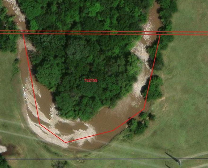 Own a special piece of Texas! This secluded 2-acre waterfront property on the West Fork of the Trinity River is minutes from the metroplex between Boyd and Eagle Mountain Lake. A heavily wooded sportsman’s paradise with abundant fishing and hunting opportunities. Surrounded by Trinity River, the property is accessible by canoe or boat. The north side bordered by Tarrant Regional Water District (TRWD) property; buyer must secure own access with TRWD to the land. Located in 100-year flood zone. Ideal for a hideaway, off-grid or prepper living or retreat. Seller financing available.  Seller to provide a $250 Cabella's gift card to a successful buyer with a full price offer. Buyer to confirm school zoning.