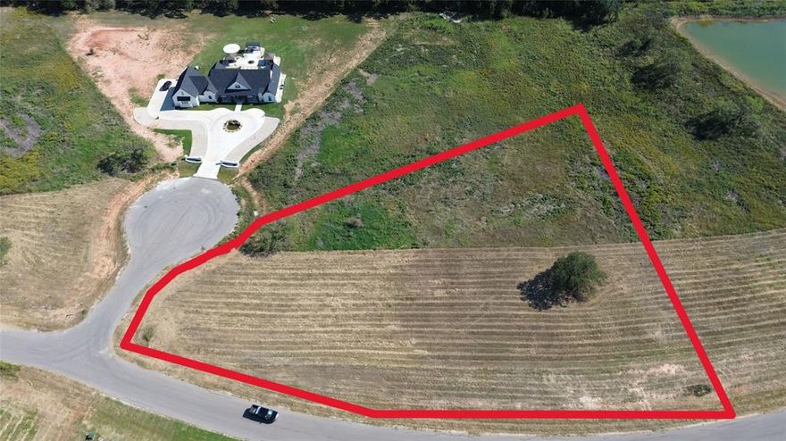 Welcome to Vista Oaks! Vista Oaks is located on the outside of Granbury, close to all the amenities your heart desires and the seclusion of being nestled in the country. Vista Oaks is only a short drive from Glen Rose Hwy and only 12 minutes from shopping, dining, and Lake Granbury. 3038 Haylee Drive is a beautiful 2.015-acre residential lot located in the beautiful, private cul-de-sac in the Vista Oaks subdivision. The lot is wide open, offering the perfect setting for creating your dream home, with plenty of room for outdoor living, recreation, and privacy. Enjoy the tranquility and charm of this sought-after area, where you can build a custom home tailored to your vision while being part of a friendly and welcoming community. Give us a call to find out more about 3038 Haylee Drive and other lots available at the beautiful Vista Oaks!