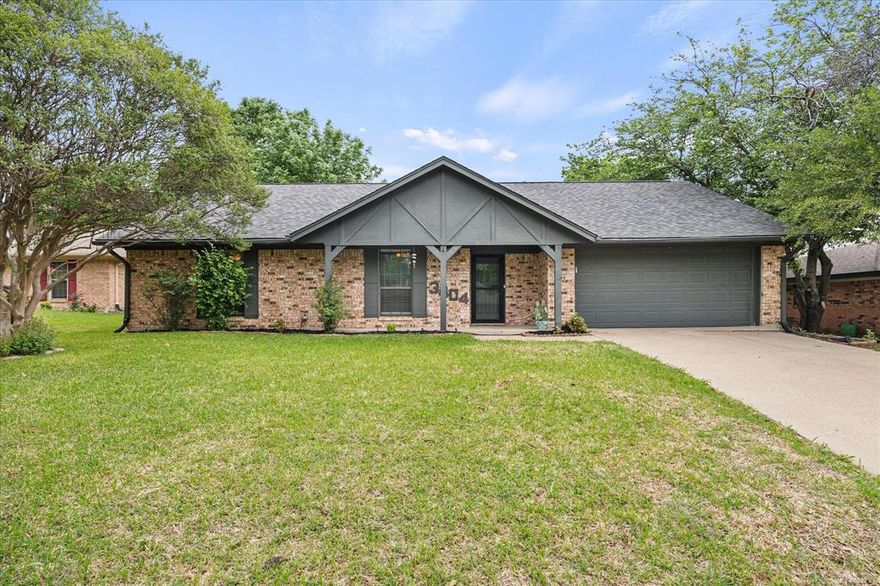 Welcome to 3404 Canton Street in Greenville, TX, a beautifully maintained home on a quarter-acre fenced lot near schools, parks, shopping, and dining. This updated home features luxury vinyl plank flooring, fresh paint, popcorn ceilings removed, upgraded ceiling fans and light fixtures, and an open living and dining area for a more functional layout. The fireplace adds charm, and the kitchen features solid-wood cabinetry and a newer dishwasher. The primary bath offers glass shower doors. Exterior updates include storm doors, outdoor uplighting, and a peaceful 10x12 back patio deck. The spacious backyard opens to a large field maintained by the nearby church, creating an open and private feel. The roof was replaced in 2020. Foundation repairs completed by Olshan in 2023 with a lifetime transferable warranty. This is a wonderful opportunity for buyers seeking an updated, quick-move-in-ready home in Greenville, Texas.