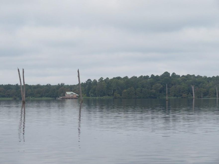 Lake front lot on beautiful Lake Erling. Just north of Arkansas state line near Springhill, LA. Located in a gated community with HOA, underground electric & sewer tap (One time sewer tap fee.). Cleared & ready for your dream home or just your weekend hide away. No MFG homes. (Photos may be a scenic view of Lake Erling & may not be representative of actual lot.)