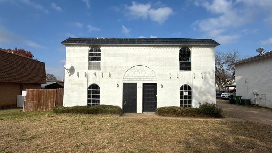 Prime investment opportunity. Full duplex vacant and ready to make your own with each unit offering approximately 1,050 sqft of living space. Both units feature two second-floor bedrooms, 1.5 bathrooms, and covered rear parking. Ideal for an investor or owner-occupant seeking to live in one unit while renting the other. Conveniently located near major highways and downtown Fort Worth, just minutes from AT&T Stadium, Six Flags, and Globe Life Field. Don’t miss this exceptional opportunity. SOLD AS-IS