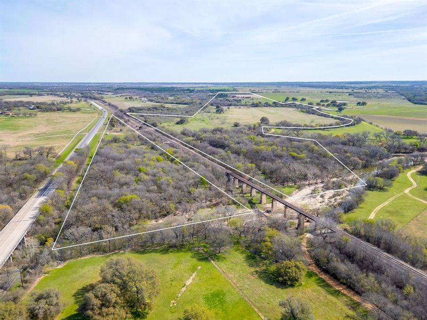 Discover ±146 acres of scenic Texas countryside in Blum, TX on the Nolan River with an appealing blend of elevation changes, river frontage, wide-open grazing land, and dense native hardwood cover. Scenic frontage along the beautiful Nolan River stretches across the interior of the ranch, creating a serene waterfront backdrop and prime habitat for wildlife.  A well-established trail system allows convenient access across the ranch for riding, hiking, or ATV use. Currently enjoyed for hunting and recreation, the property offers excellent flexibility for ranching, building your dream home, creating a private getaway, or holding as an investment property.  This property can be subdivided for future use or investment.