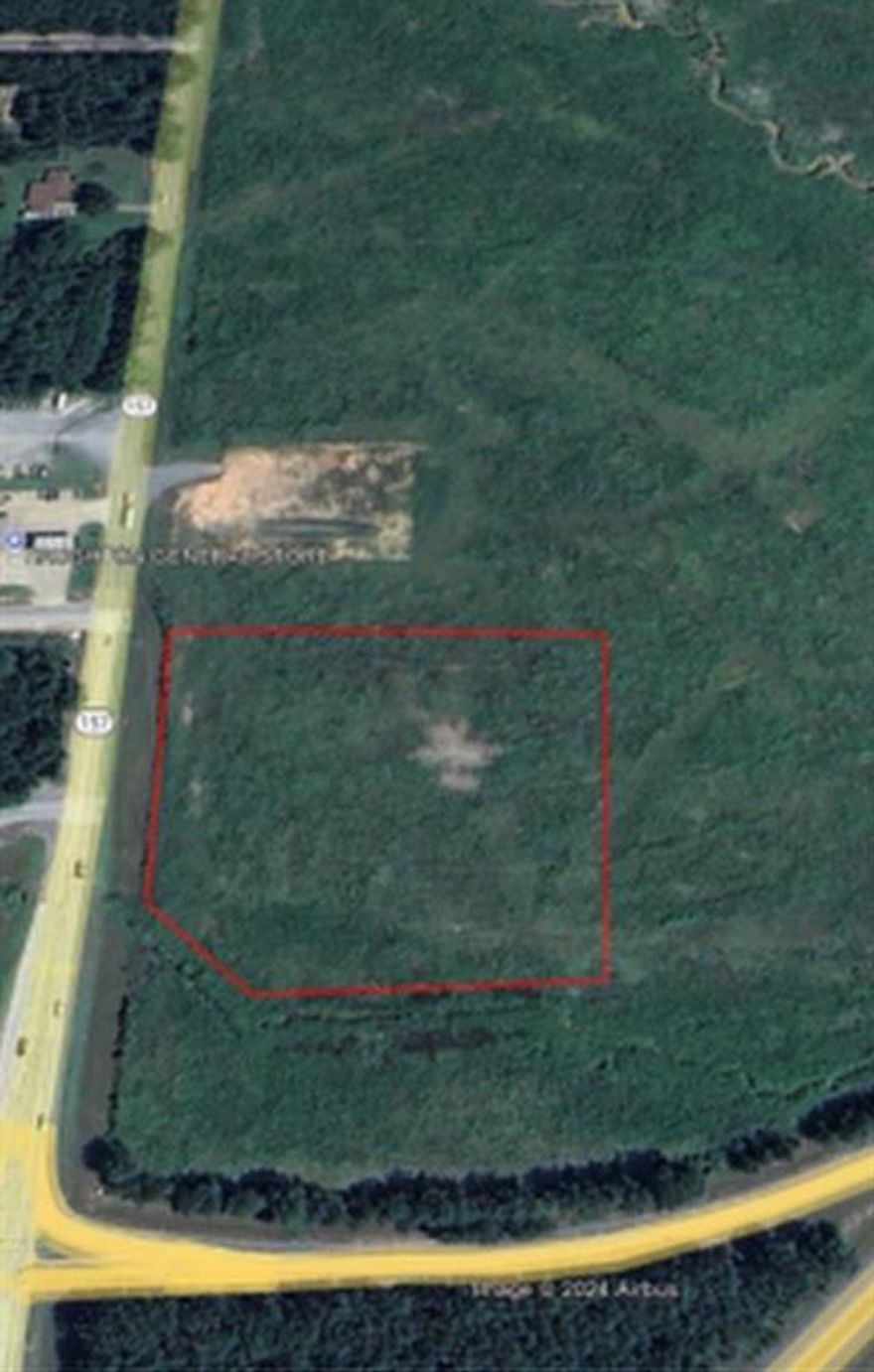 5 Acres at corner of Interstate 20 and Highway 157: Prime tract of land adjacent to I-20 at Haughton Exit 33. 5 acres at exit ramp, north side of I-20 and east side of Hwy 157 and runs from I-20 . Seller will subdivide. This is an ideal location for a travel center, hotel, restaurants, fuel companies, distribution centers, car dealerships, medical industry, pharmacies, banks, grocery stores and much more. Property is not in a flood zone. Call realtor today for more info.
