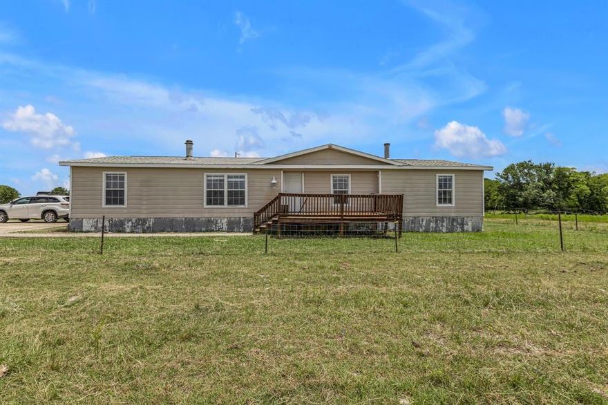 JUST LISTED – Nearly 10 Acres in Rapidly Growing Forney, TX with mobile home! Mobile home is 2 bedrooms and 2 baths approx 1640 SF. Prime opportunity for homeowners or developers. Located off FM 740, just north of I-20 and approx. 9 miles from I-635, this property offers excellent access to major highways and nearby amenities. Utilities on-site: electricity, water, and septic. AG exemption in place. Situated in Kaufman County’s unincorporated area with development potential. Build your dream home with space and privacy or take advantage of this fast-growing area for your next project. Don’t miss out on this rare Forney land listing! Stocked pond on site and road access can easily be developed. Can be sold together with MLS 20988087 for a combined tolal of 30 acres, contact agent for more details. Buyer and buyers agent to verify schools and measurements.